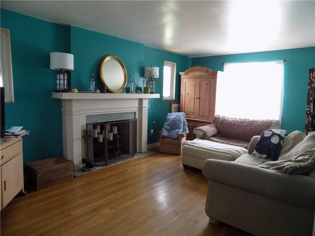 2011 Brookfield Road Pittsburgh, PA 15243 - Photo 3 of 17 a living room with furniture and a fireplace