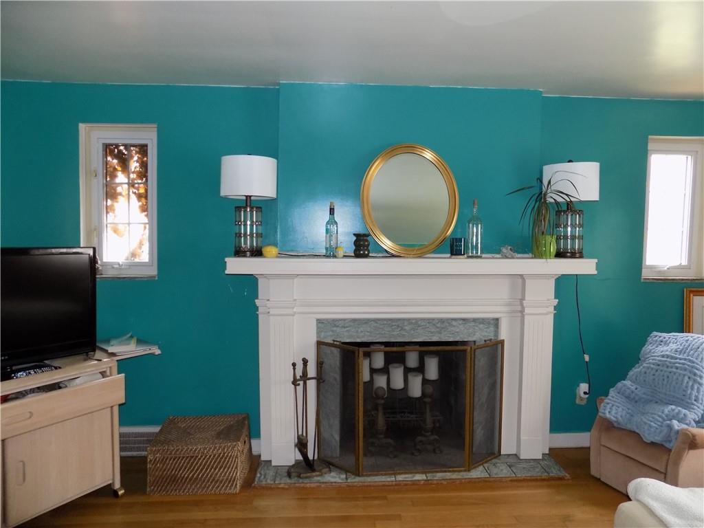 2011 Brookfield Road Pittsburgh, PA 15243 - Photo 4 of 17 a living room with furniture and a fireplace