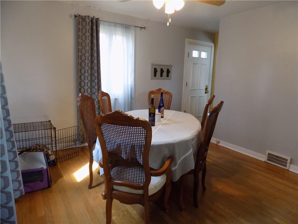 2011 Brookfield Road Pittsburgh, PA 15243 - Photo 7 of 17 a view of a dining room with furniture and wooden floor