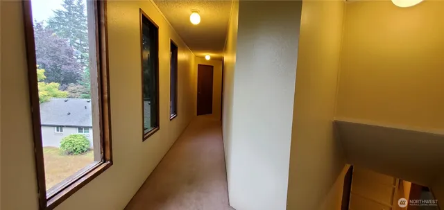 a view of a bathroom with a glass door