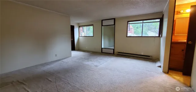 an empty room with windows