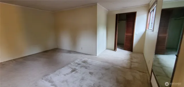 a view of hallway with a small space