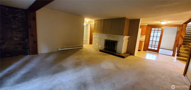 a view of a livingroom with a fireplace