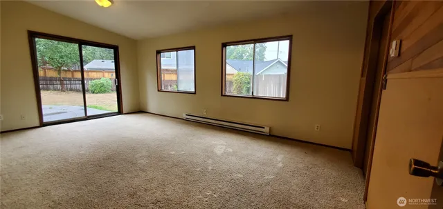 an empty room with windows