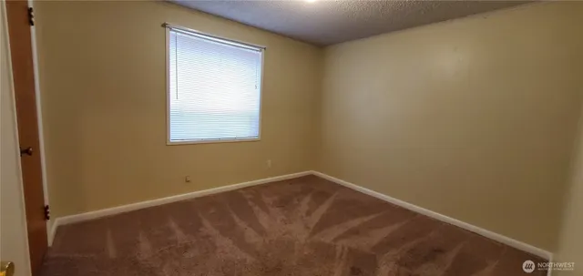 a view of a small space with a window