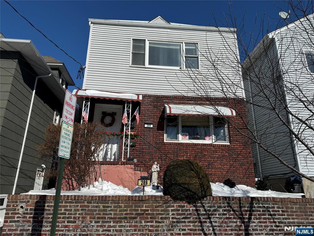 289 Grove Street East Rutherford, NJ 07073 - Photo 1 of 1 a view of house with a window and car parked