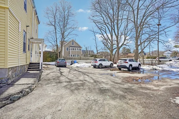 an aerial view of residential house with parking space