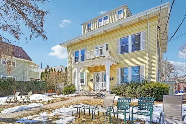 a kitchen with granite countertop stainless steel appliances a stove a sink and a refrigerator
