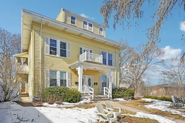 a kitchen with granite countertop a sink and a wooden floor