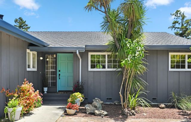 a front view of a house with patio