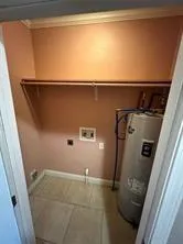 a bathroom with a bathtub and toilet