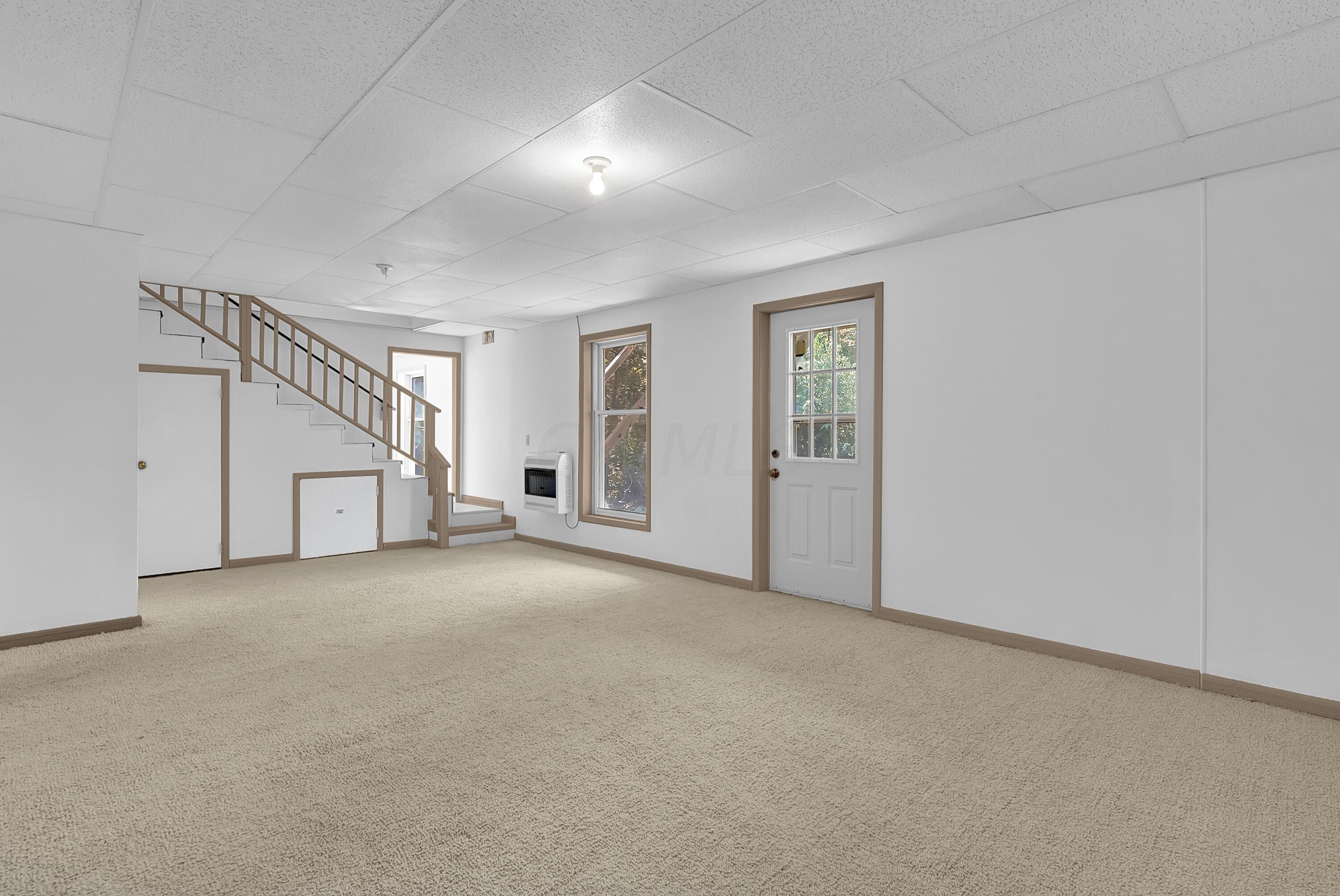 6865 Revenge Road Southwest Lancaster, OH 43130 - Photo 28 of 35 Second basement room with exit door