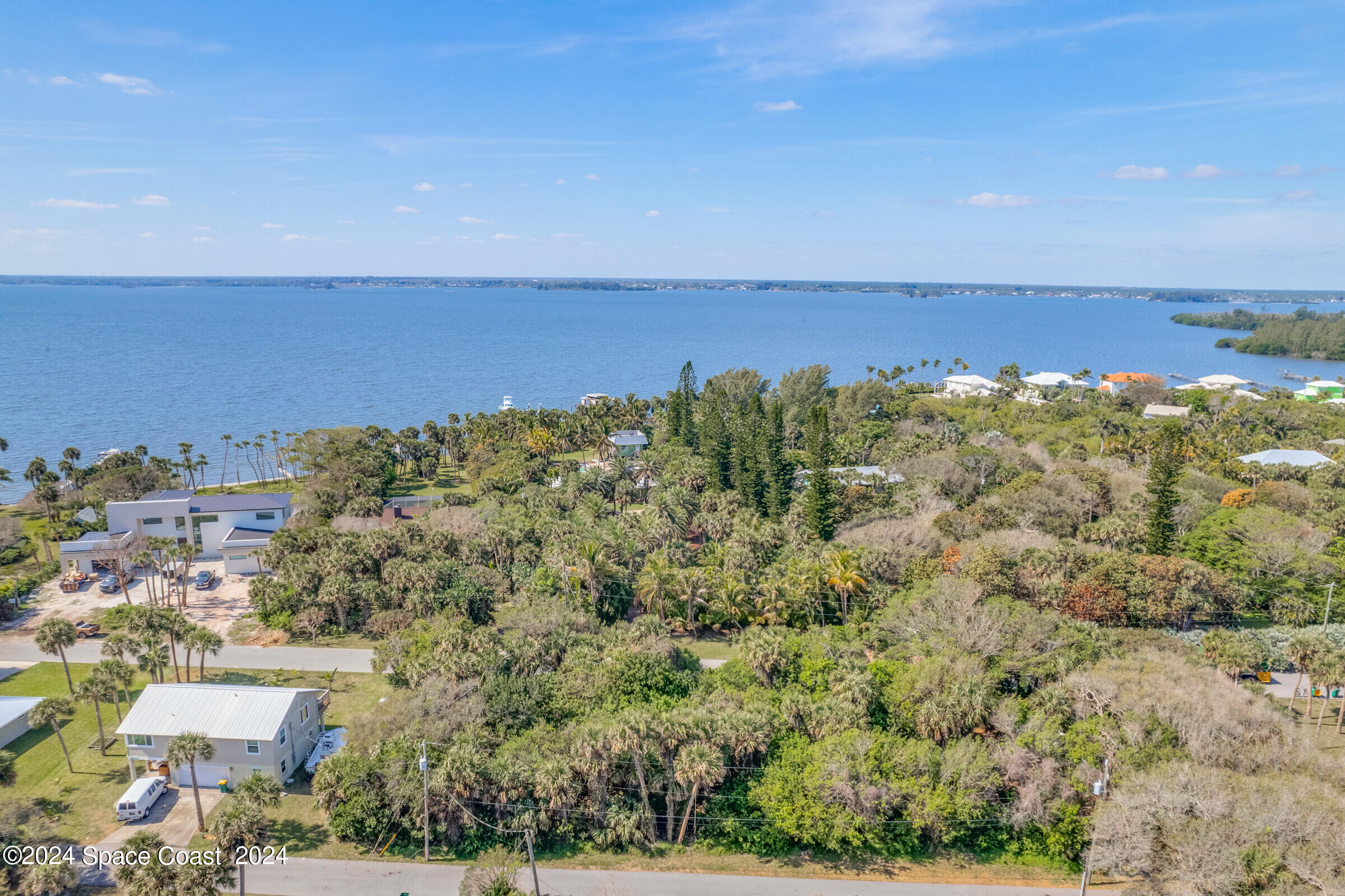 0 Winona Road Melbourne Beach, FL 32951 - Photo 17 of 27 an aerial view of a house with a lake view