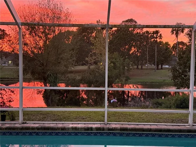 a view of a yard with a car park