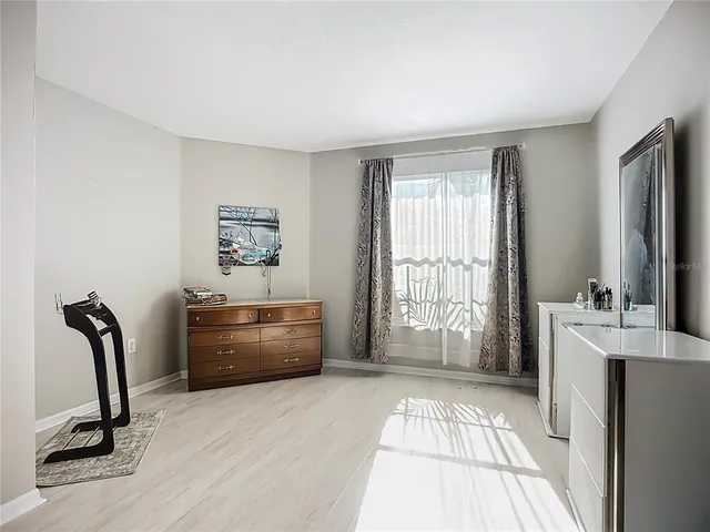 a room with furniture and window