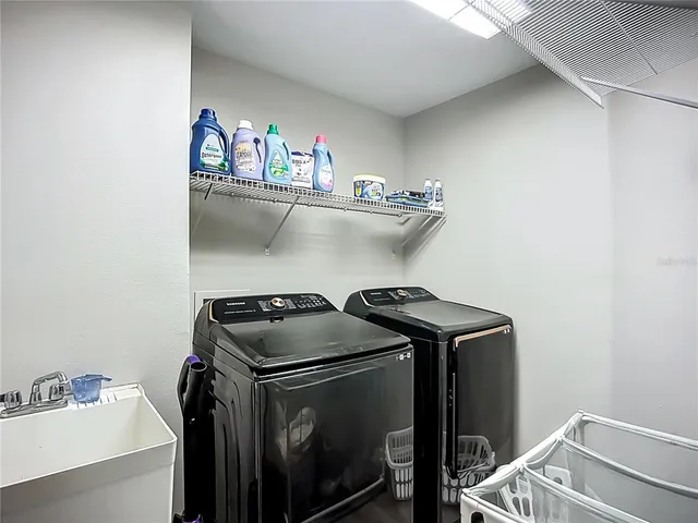 a view of a swimming pool with a porch