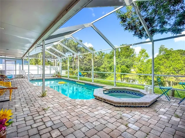 a view of a backyard with porch