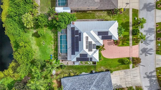 a view of a lake with a yard