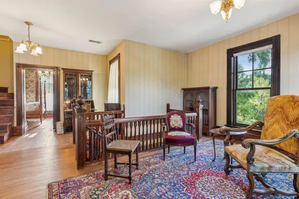 a living room with furniture and a window