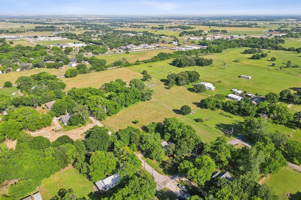 405 West Clifton Street Pilot Point, TX 76258 - Photo 26 of 33 a view of city and ocean