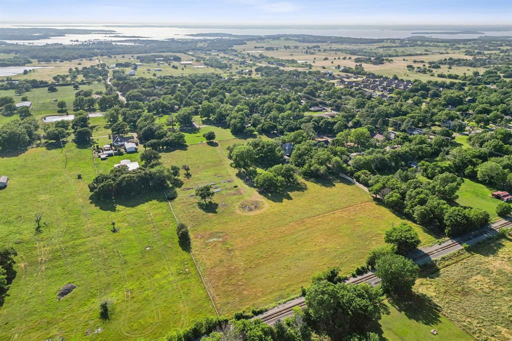 405 West Clifton Street Pilot Point, TX 76258 - Photo 27 of 33 a view of lake view and mountain