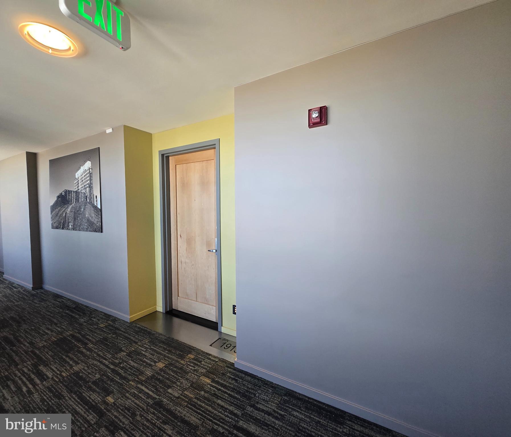 1200 Steuart Street, Unit 1913 Baltimore, MD 21230 - Photo 4 of 57 Refined hallway approach.