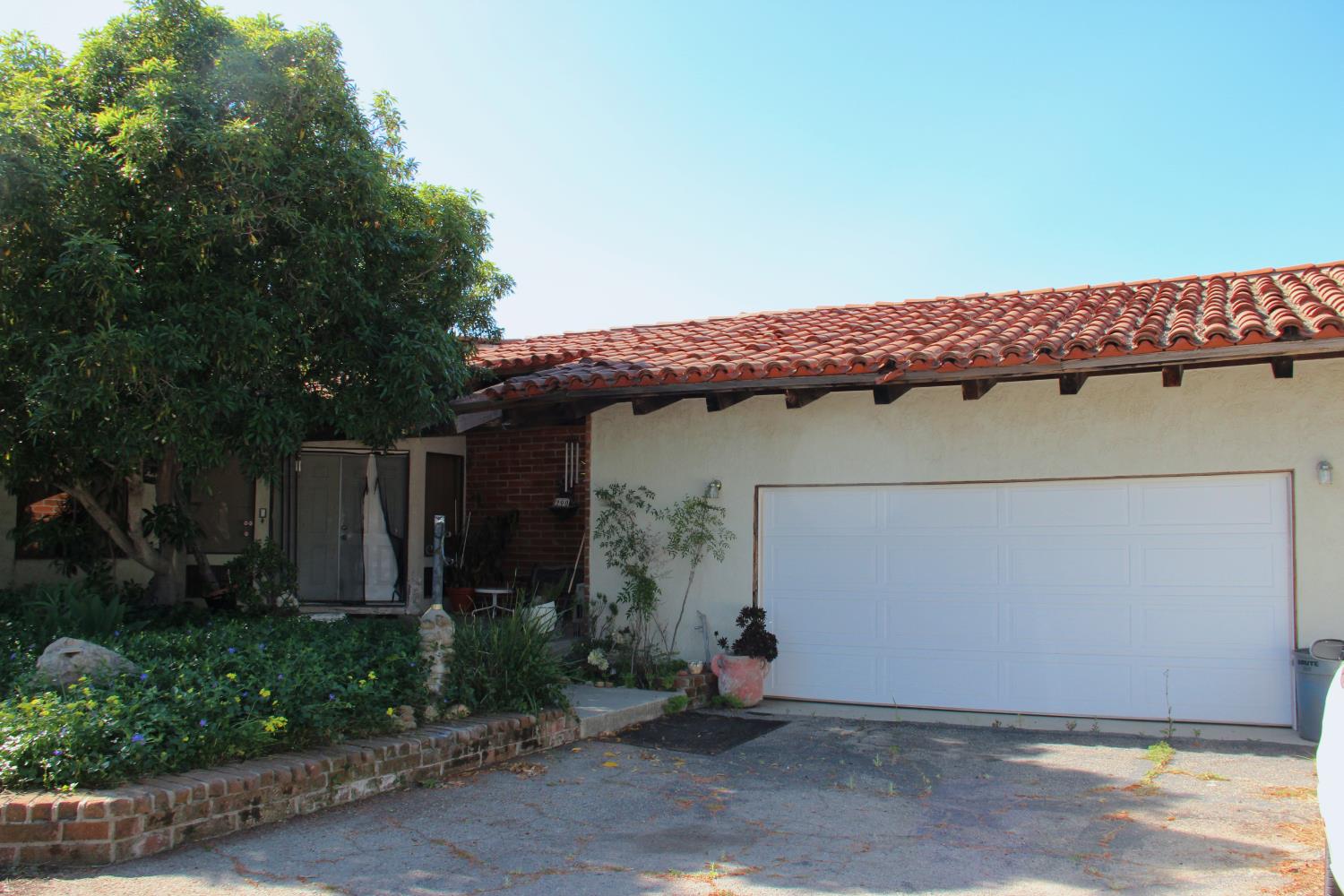 290 Encino Drive Oak View, CA 93022 - Photo 2 of 14 a front view of a house with a garage