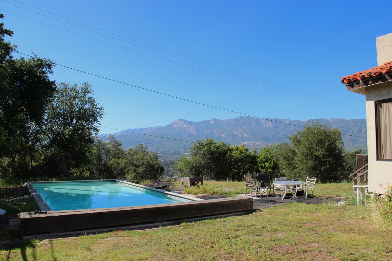 290 Encino Drive Oak View, CA 93022 - Photo 4 of 14 a view of a swimming pool with a yard and mountain view