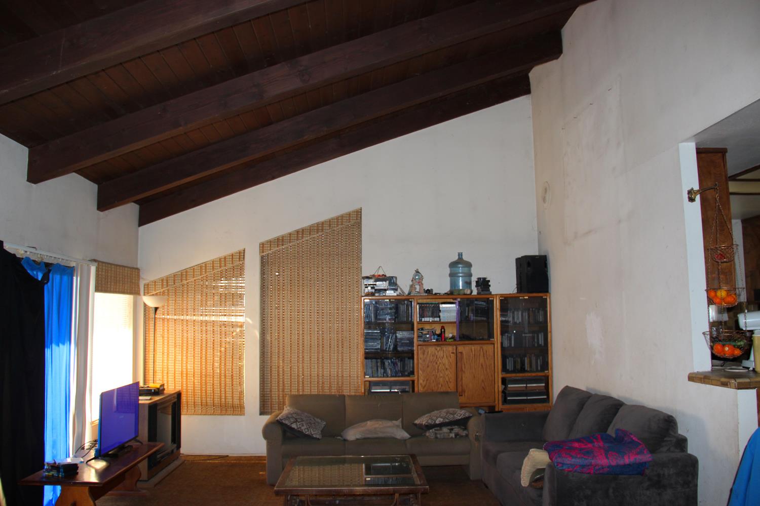 290 Encino Drive Oak View, CA 93022 - Photo 8 of 14 a living room with furniture and a book shelf