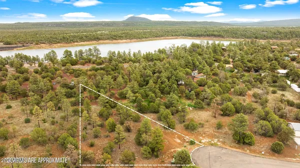 a view of an ocean and mountain