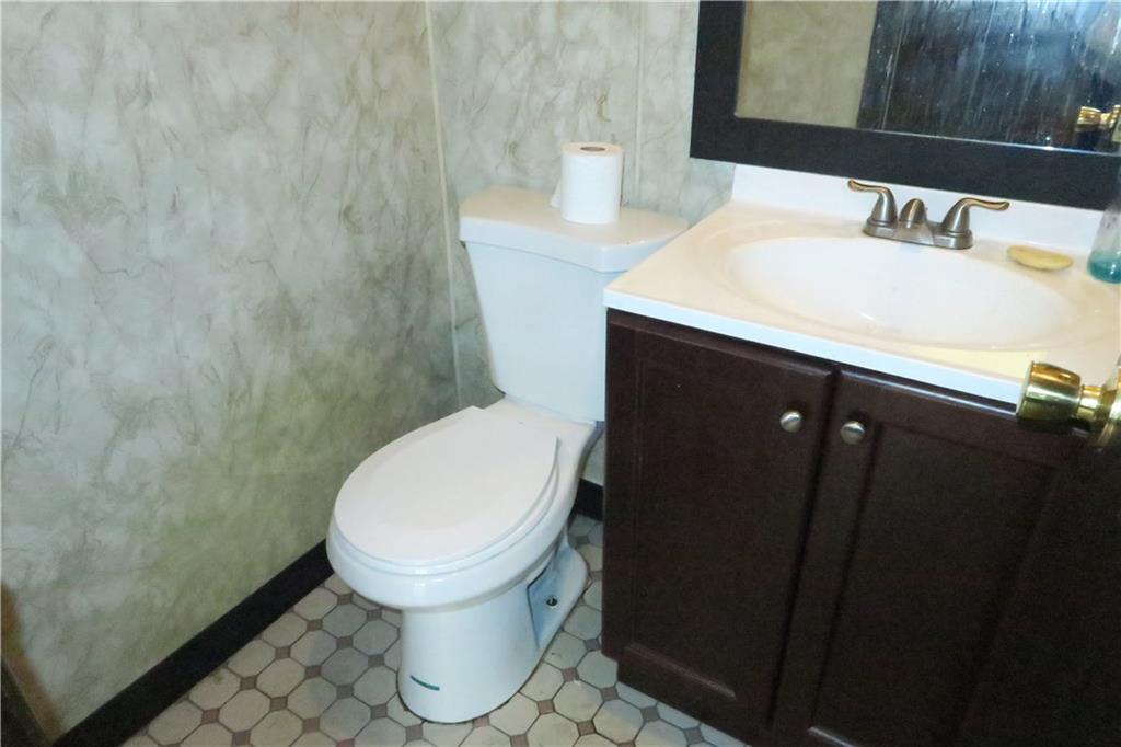 160 Talmadge Road Edison, NJ 08817 - Photo 6 of 8 a bathroom with a sink and a toilet
