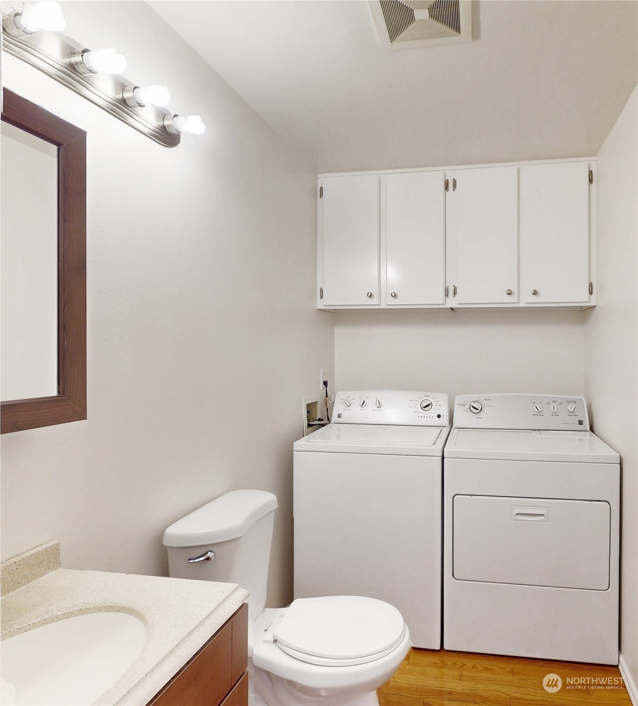 6426 Cady Road Everett, WA 98203 - Photo 30 of 39 a bathroom with a toilet sink and vanity