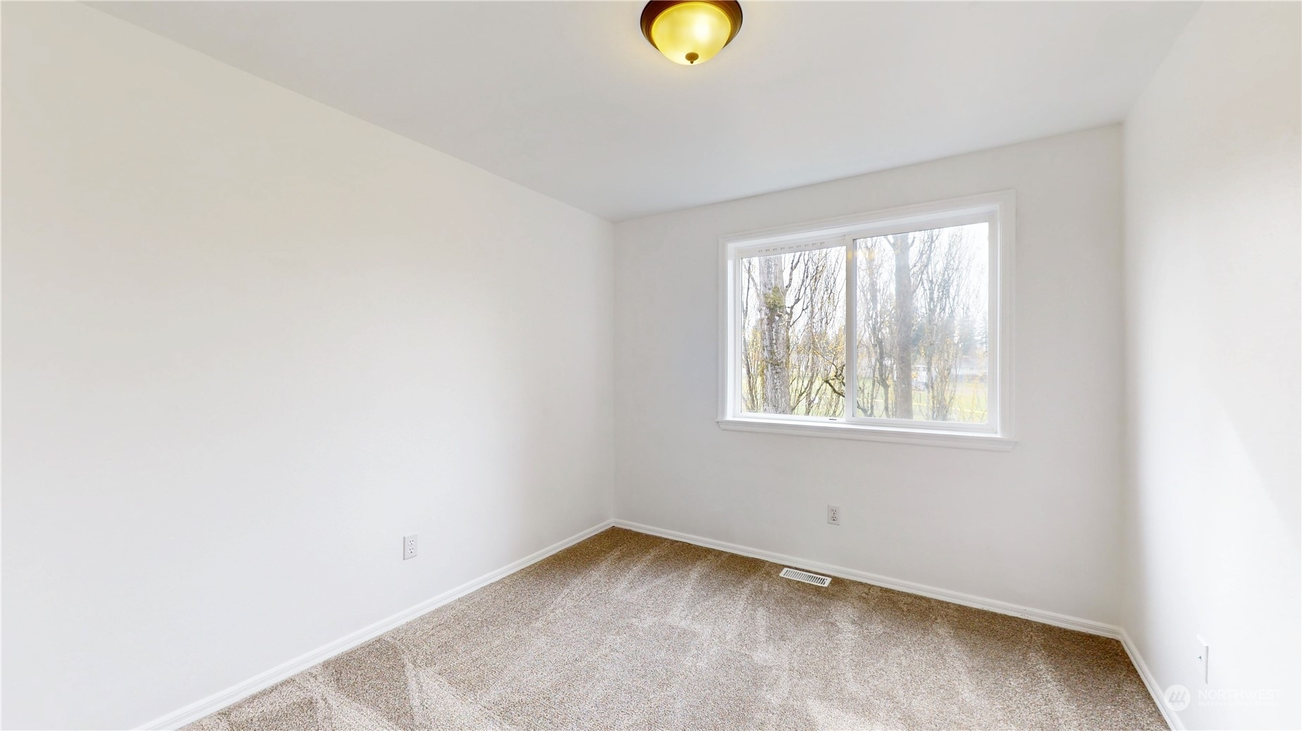 6426 Cady Road Everett, WA 98203 - Photo 34 of 39 a view of a room that has a window