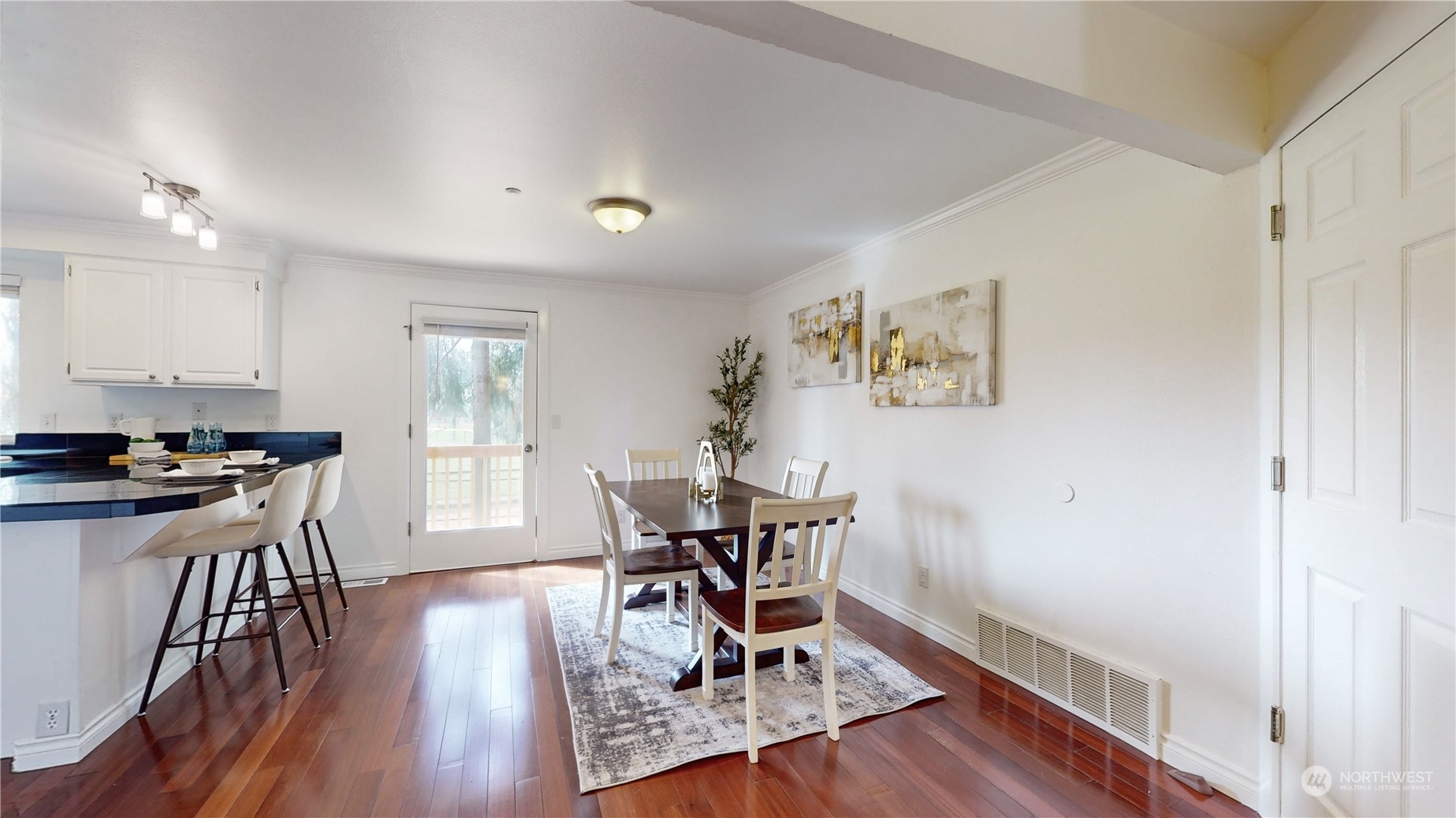 6426 Cady Road Everett, WA 98203 - Photo 4 of 39 a view of a dining room with furniture window and wooden floor