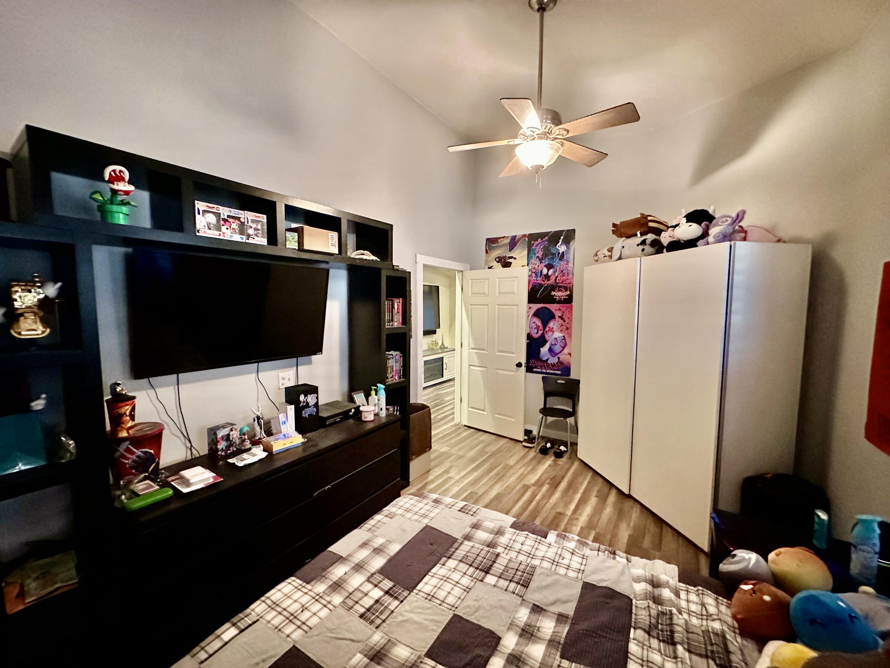 1461 Mesquite Road Blythe, CA 92225 - Photo 16 of 30 a living room with furniture and a flat screen tv