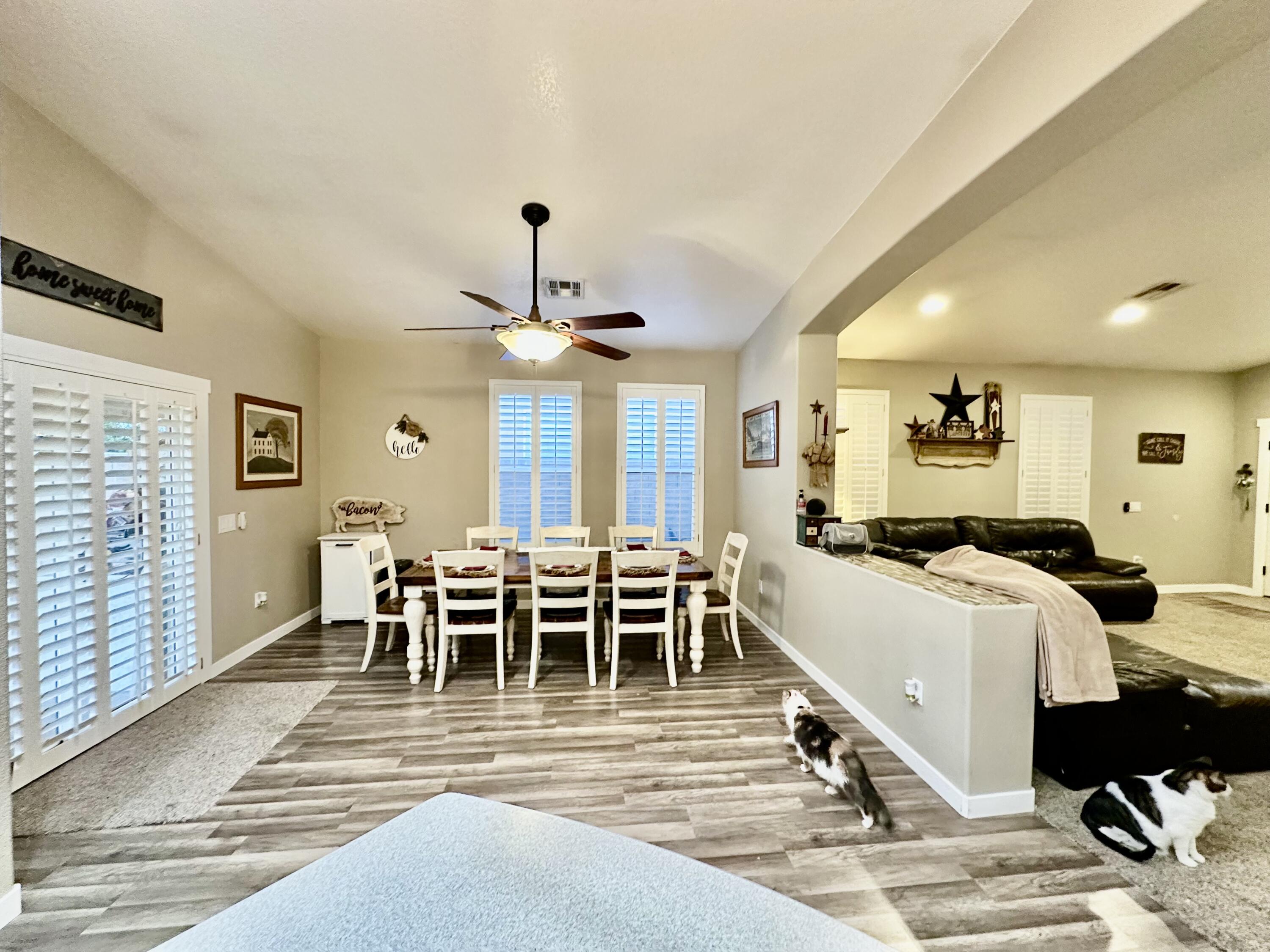 1461 Mesquite Road Blythe, CA 92225 - Photo 7 of 30 a view of a dining room with furniture and chandelier