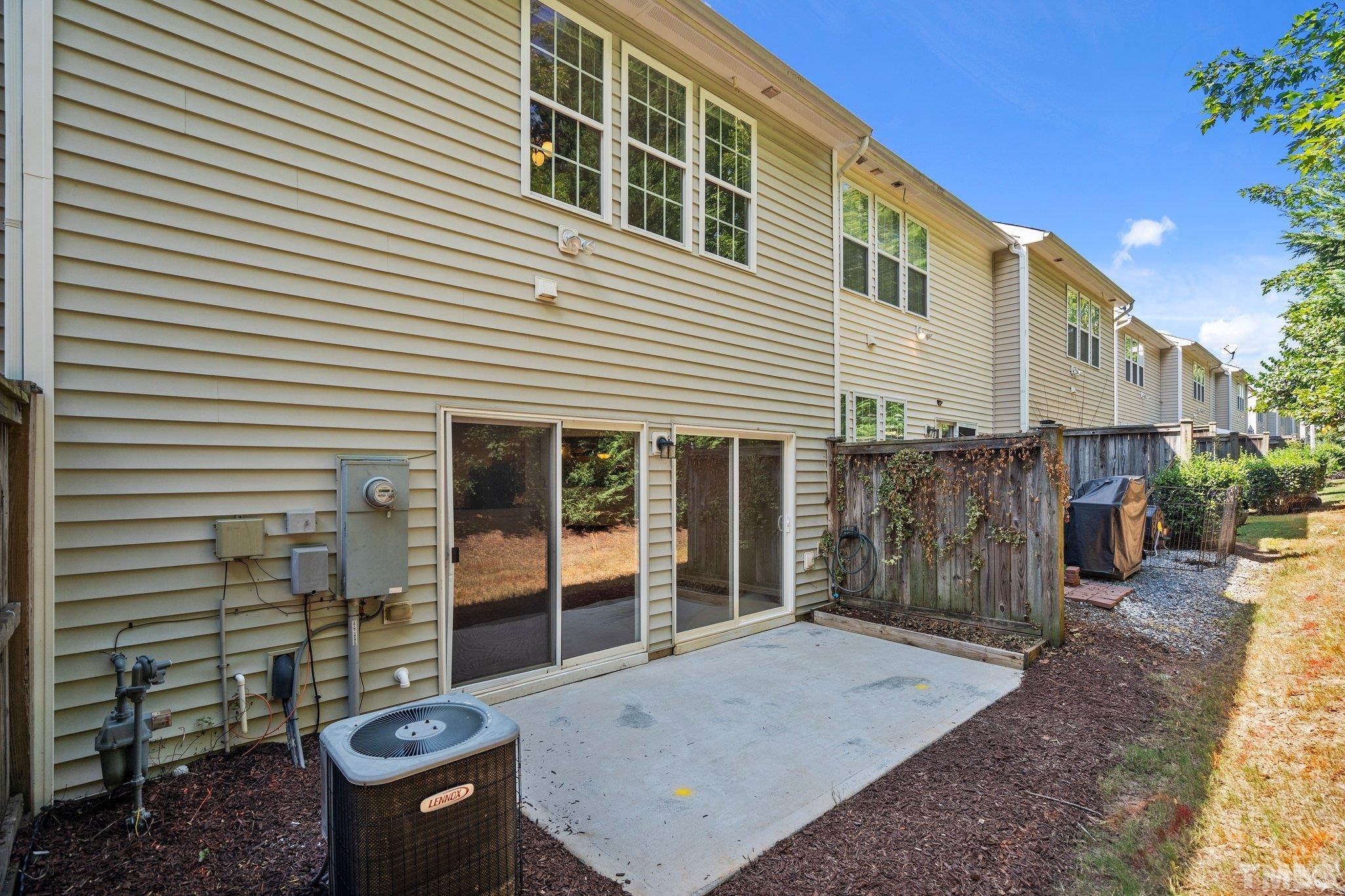 8308 Pilots View Drive Raleigh, NC 27617 - Photo 13 of 29 a view of a house with backyard