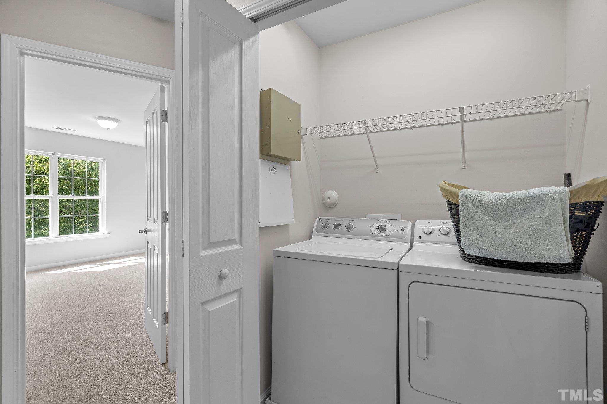 8308 Pilots View Drive Raleigh, NC 27617 - Photo 24 of 29 a utility room with dryer and washer