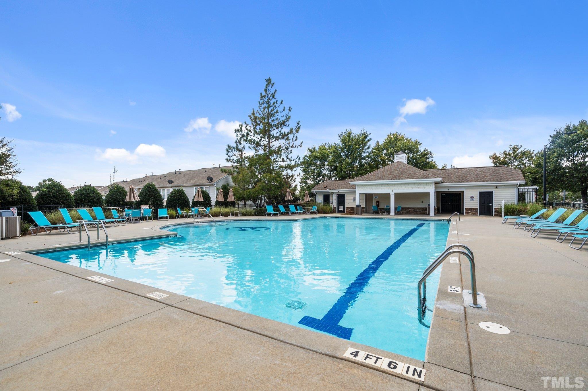 8308 Pilots View Drive Raleigh, NC 27617 - Photo 27 of 29 a view of a swimming pool with a yard