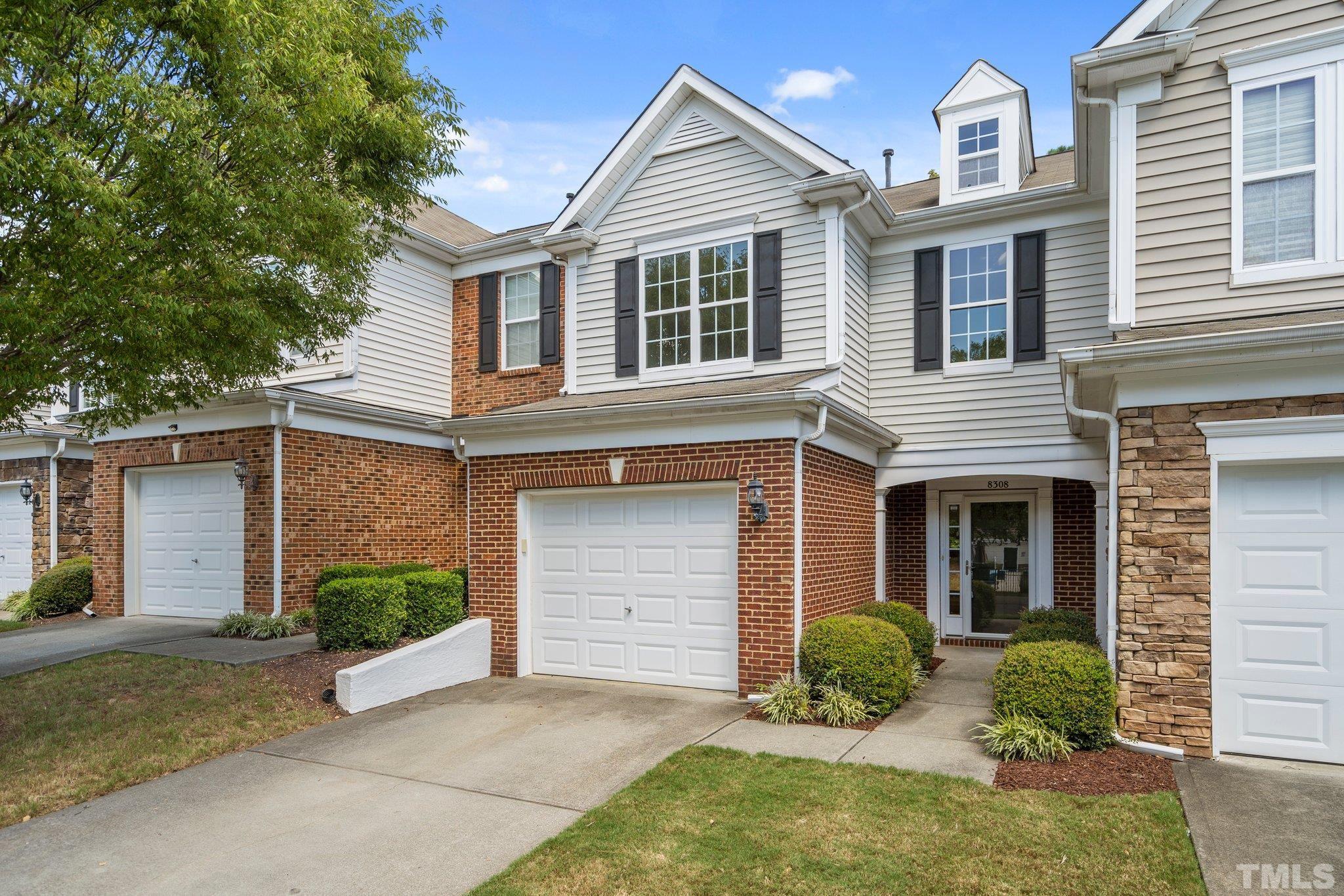 8308 Pilots View Drive Raleigh, NC 27617 - Photo 29 of 29 a front view of a house with garden