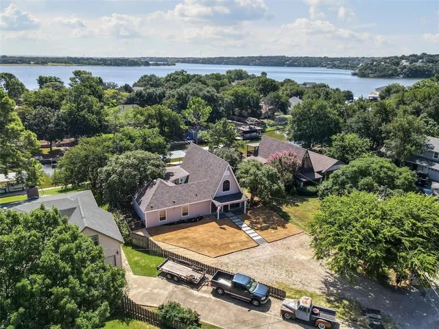 an aerial view of a house with a garden