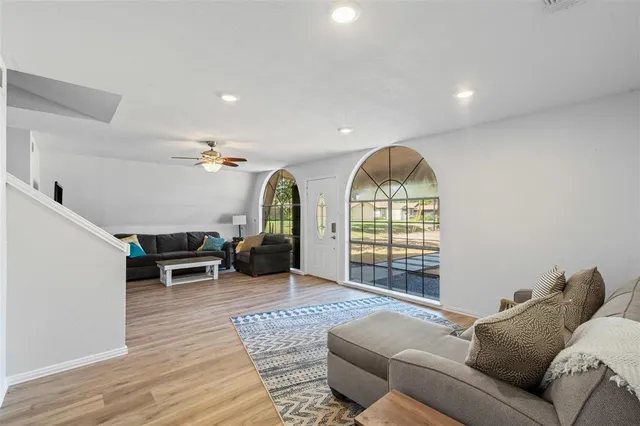 a living room with furniture and a window
