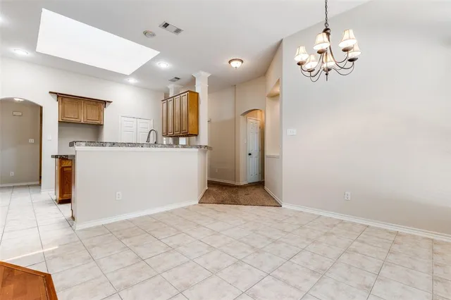 a view of a kitchen with a sink