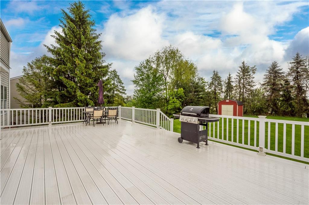 602 Birch Court Bridgeville, PA 15017 - Photo 14 of 47 a view of a roof deck with couches and wooden fence