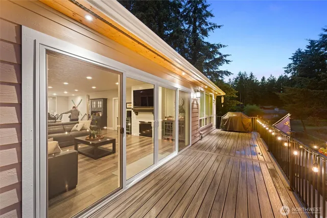a view of a balcony with wooden floor