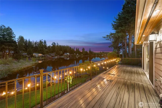 a view of a balcony with lake view