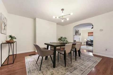 a view of a dining room with furniture