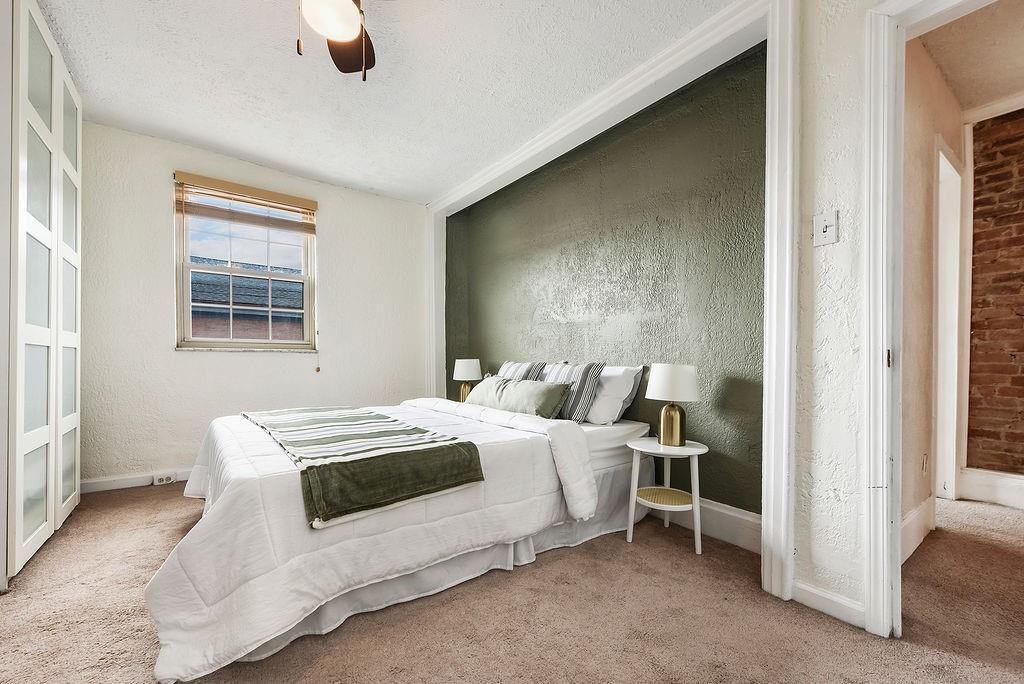 1302 Boyle Street Pittsburgh, PA 15212 - Photo 24 of 50 a bedroom with a bed and a window
