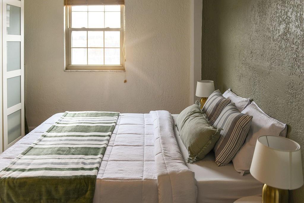 1302 Boyle Street Pittsburgh, PA 15212 - Photo 26 of 50 a bedroom with a bed and a window
