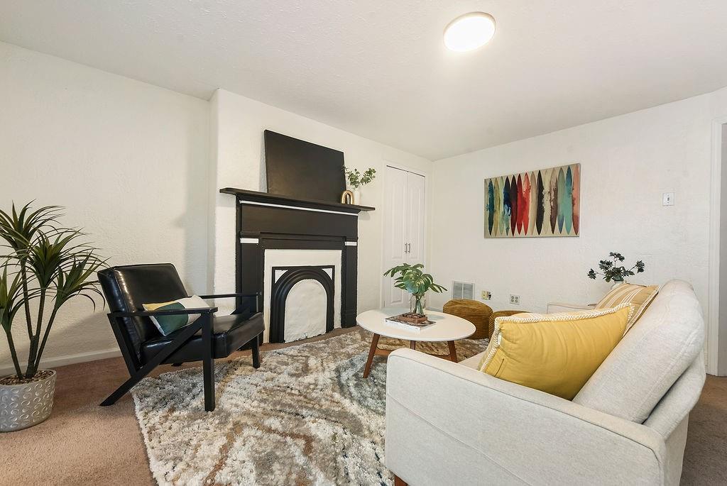 1302 Boyle Street Pittsburgh, PA 15212 - Photo 28 of 50 a living room with furniture and a flat screen tv